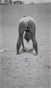 (THE ENDS) A choice group of 34 delightful snapshots featuring men and women bending over,